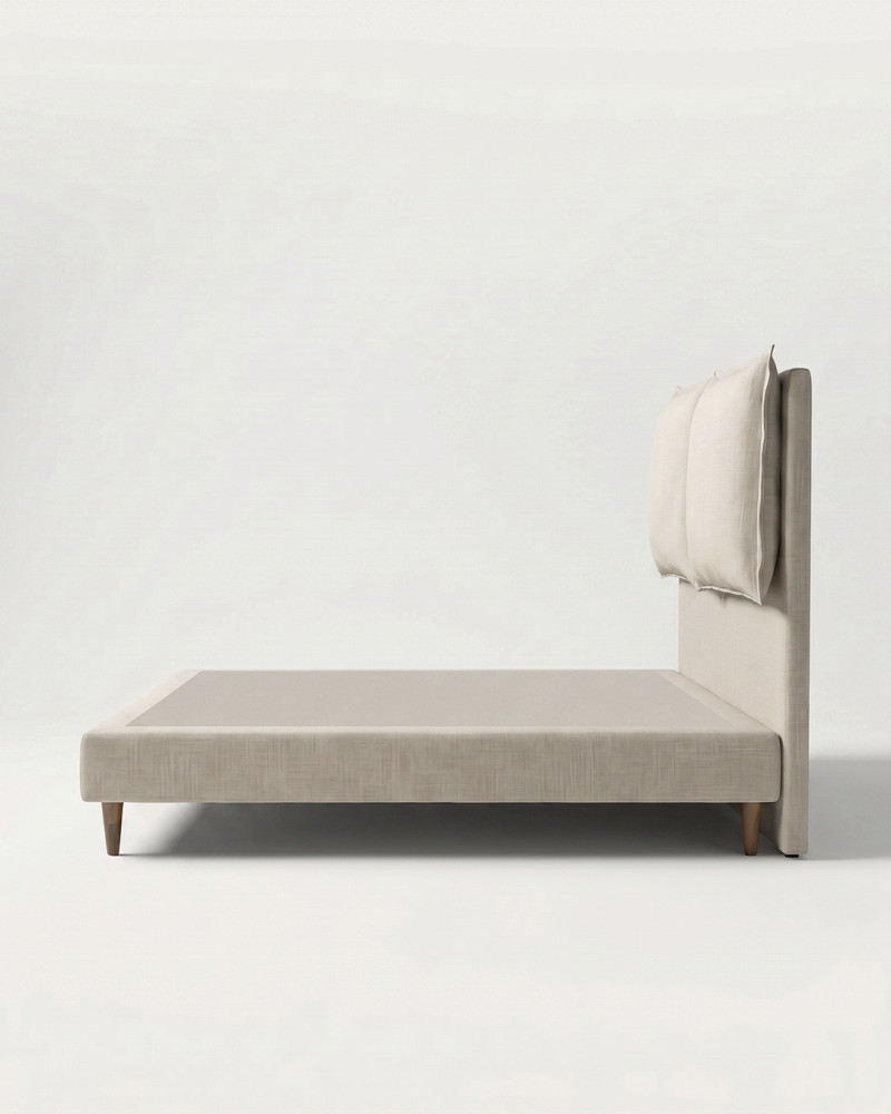 Cama con base tapizada BALOR vista lateral